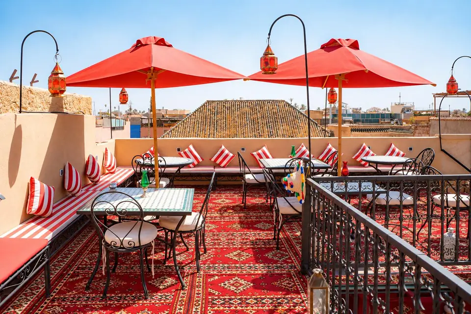 Red parasols on the rooftop terrace